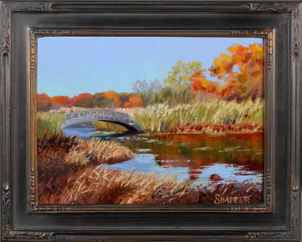 Black framed landscape oil painting of fall color and the bridge across Belleville Pond, North Kingstown, Rhode Island