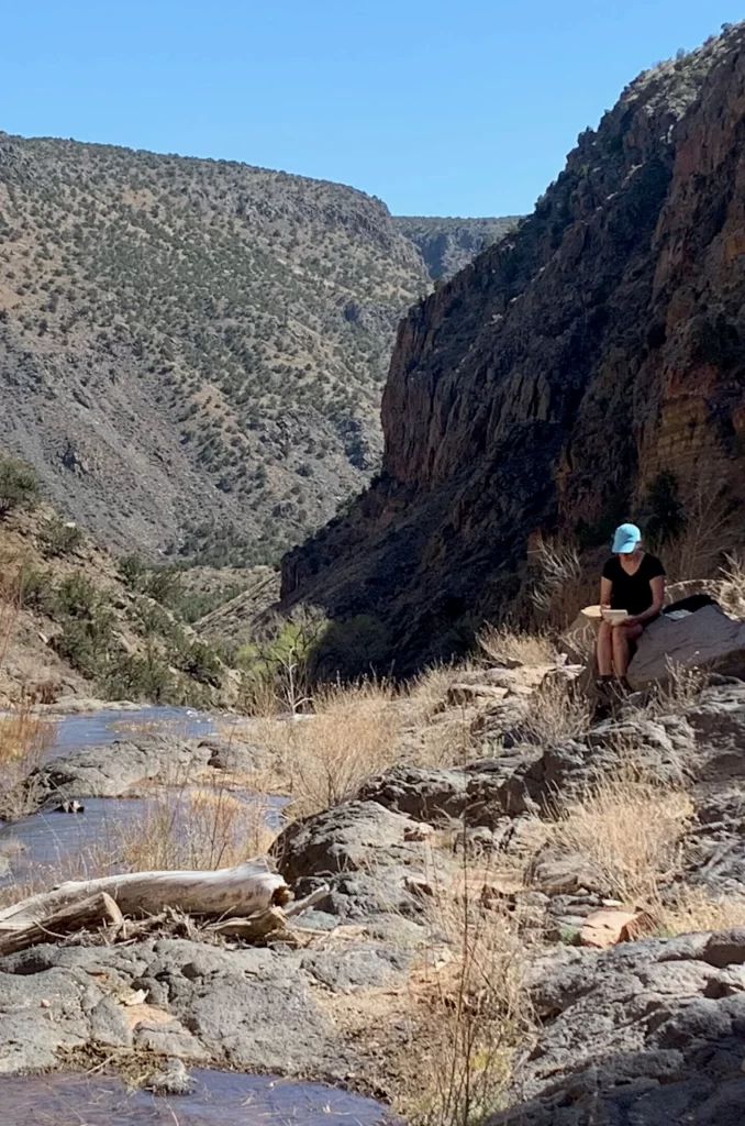 Painting at the top of the falls, Bandelier National Monument