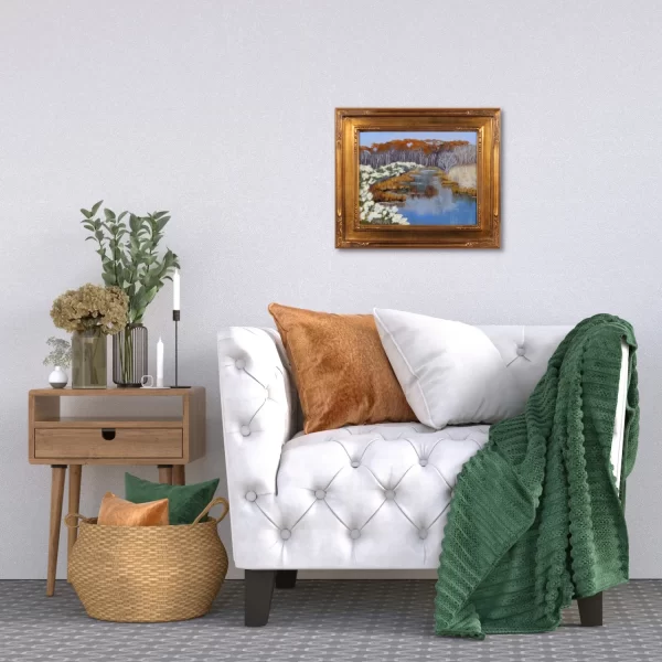 Example of interior coastal decor with framed marsh painting