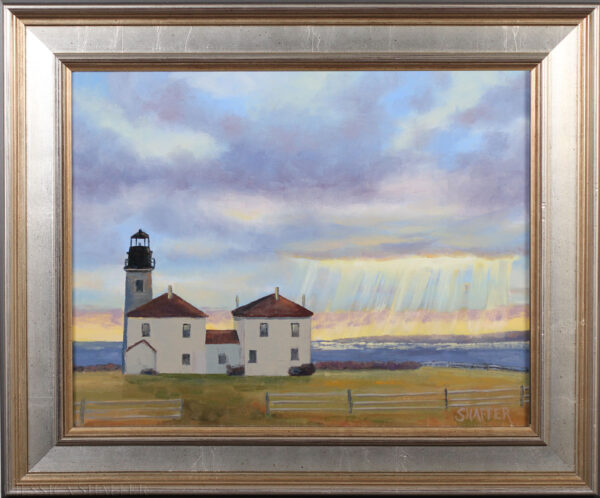 'Rays of Sunshine' landscape oil painting of Beavertail Lighthouse, Jamestown, Rhode Island. Framed in warm silver with black exterior edge.