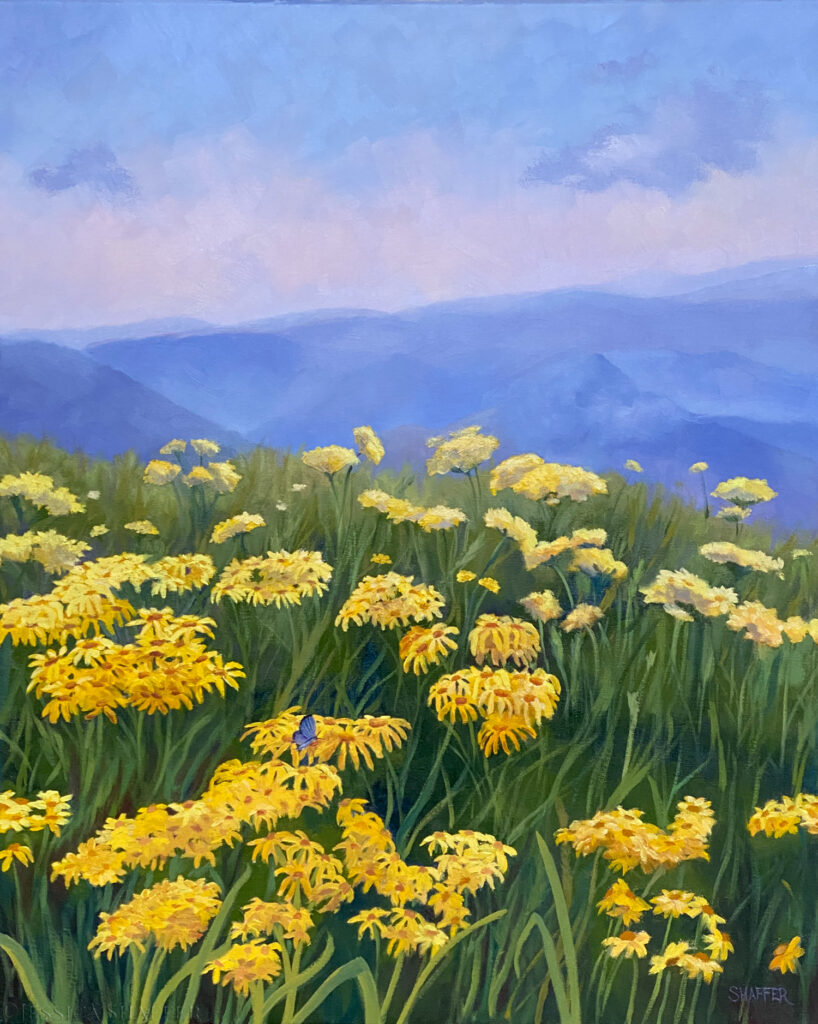 Landscape oil painting of blue mountains with a field of yellow flowers and a blue butterfly by artist Jessica Shaffer